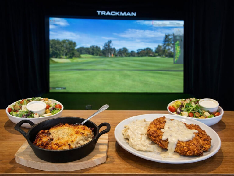 clubhouse of spearfish food and golf simulator 768x576