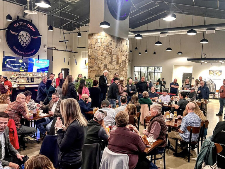 hairy cow brewing company indoors filled with patrons 768x576