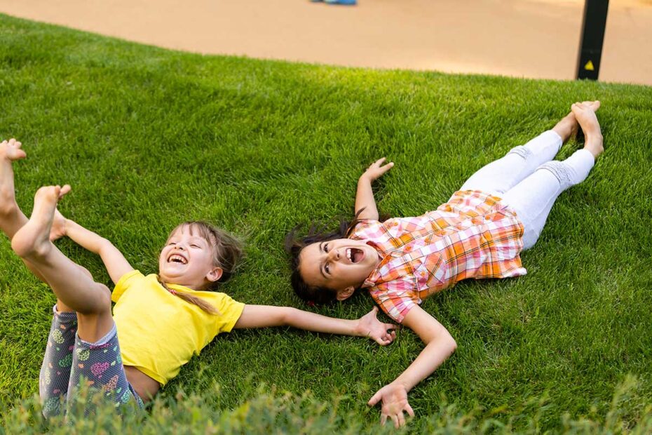 happy girls on grass